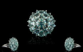 Paraibe Apatite Round Cluster Ring, a domed cluster of 4.