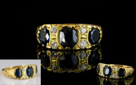 Ladies 18ct Gold and Diamond Set Dress Ring, The Three Alexandrites with Diamond Spacers.