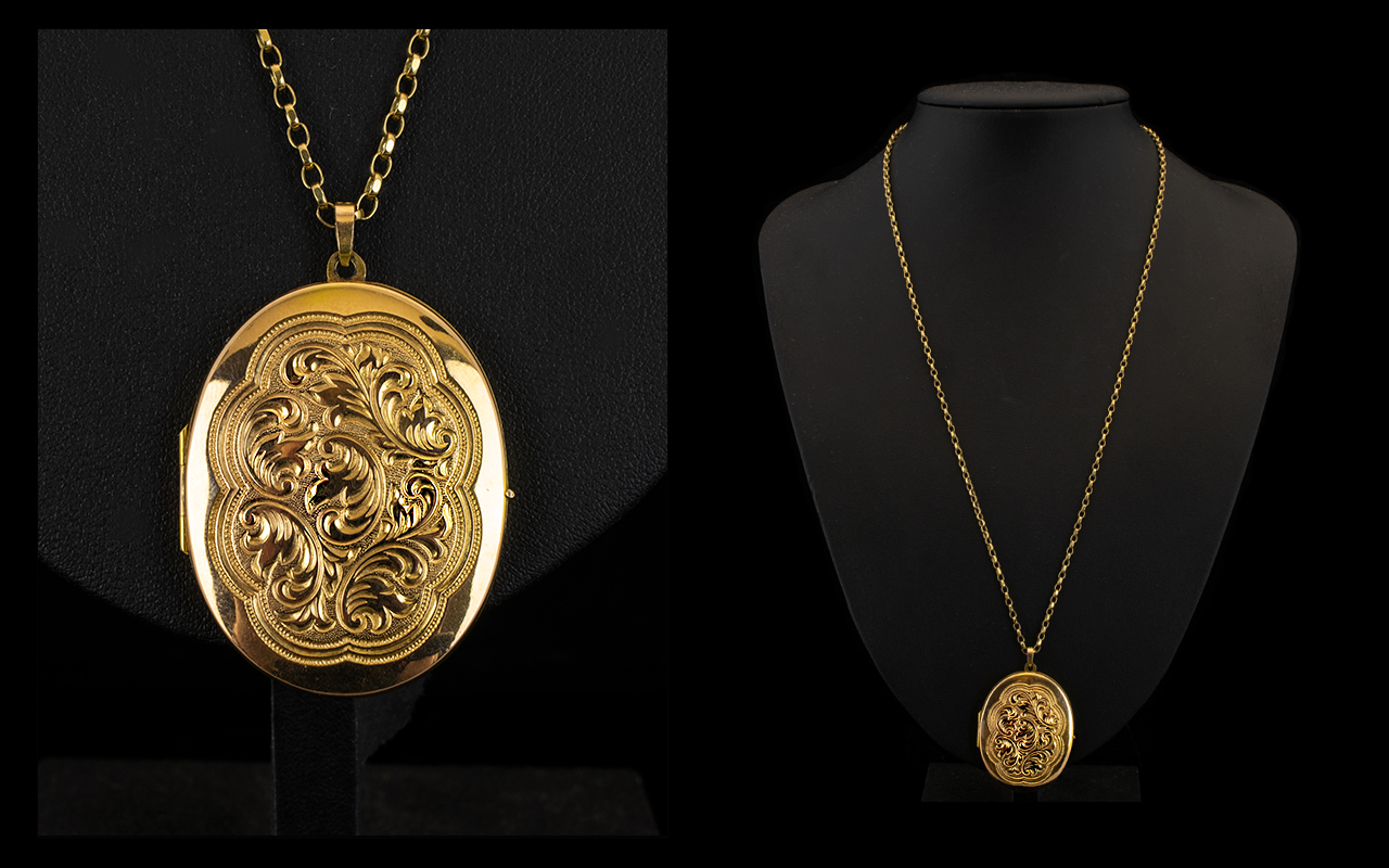 9ct Gold Large Oval Shaped Hinged Locket Attached to a 9ct Gold Belcher Chain,