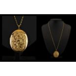 9ct Gold Large Oval Shaped Hinged Locket Attached to a 9ct Gold Belcher Chain,