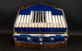 A Canteen Of Cutlery Housed in traditional fitted wooden box, comprising knives, forks,