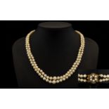 1960's Nice Quality and Well Matched Double Strand Cultured Pearl Necklace with Circular 9ct Gold