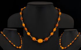 Butterscotch Amber Beaded Wired Necklace Antique necklace, circa 1920's,