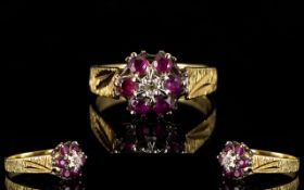 Ladies 18ct Gold Diamond & Garnet Set Cluster Ring. Flower head setting fully hallmarked for 750.