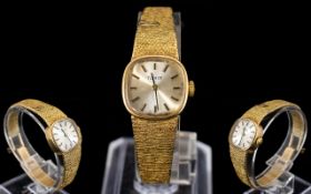 Tissot - Ladies Mechanical Wind 9ct Gold Wrist Watch with Integral 9ct Gold Mesh Bracelet. c.1970's.