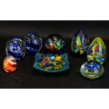 Collection of Glass Paperweights. 7 Paperweights in assorted colours and designs.