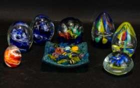 Collection of Glass Paperweights. 7 Paperweights in assorted colours and designs.