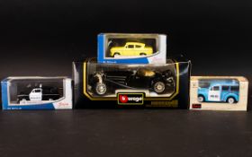 A Collection of Boxed Die-Cast Model Cars 4 in Total.