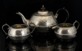 Three Piece Planished Pewter Tea Service Each with central faux riveted band, marked to base 'Halo,