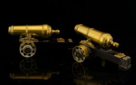 A Pair Of Brass Cannons Each with plaque marked 'HMS Drake 1954' each realistically modelled,