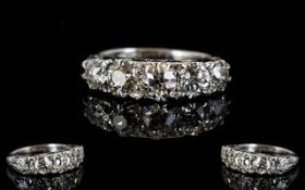 Antique 18ct White Gold Diamond Ring Set with five graduating diamonds between diamond spacers,