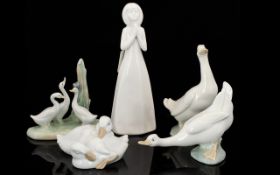 A Collection of Porcelain Figures,