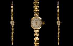 Marvin Mechanical Wind 9ct Gold Bracelet Wrist Watch with jewelled movement.