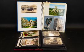 A Collection of Postcards & Collectibles in Two Albums.