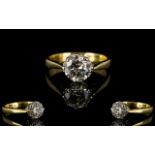 18ct Gold Single Stone Diamond Ring - the faceted round diamond of good sparkle and colour.