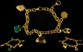 Gucci 18ct Yellow Gold Charm Bracelet Comprising six charms to include horsebit, enamel bag,