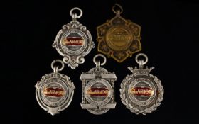 A Collection Of Four Silver And One Brass Medals/Fobs Issued By N.C.C.C Barnoldswick section clarion