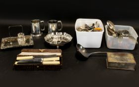 A Collection Of Mixed Plated Metal Items A varied lot to include flatware, shell form footed dish,