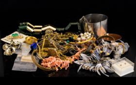 A Collection Of Costume Jewellery A varied lot, comprising various 1960's/70's stone set cuffs,