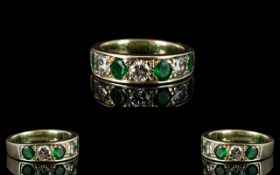 Ladies 9ct White Gold Attractive 7 Stone Emerald and Diamond Ring.