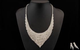 White Crystal Waterfall Necklace and Earrings, a classic, articulated, waterfall necklace,