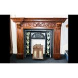 A Mahogany Fire Surround - of traditional form with reeded pillars and carved mantle detail,