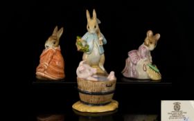 A Collection of Beswick Beatrix Potter Figures (4) 1.