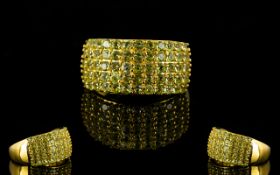 Peridot Five Row Band Ring, five rows of pave set, round cut peridots totalling 2.