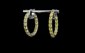 Canary Opal Hoop Earrings, large hoops set with oval cuts of the natural, ethereal yellow opal to