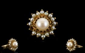 Ladies 9ct Gold Pearl Set Cluster Ring In a Flower head Design.