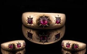 Antique Period 9ct Rose Gold 3 Stone Ruby Ring. The rubies of good colour. Ring size M. 3 Grams.