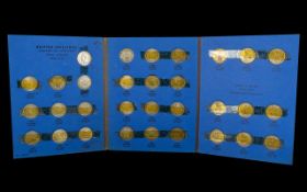 Two Folders Containing British Shillings in consecutive order from 1937-1969, some doubles.