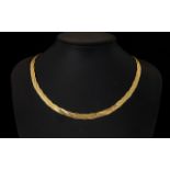 Ladies Nice Quality 9ct Gold Triple Weave Design Necklace of attractive appearance.