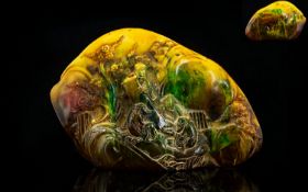 Large Carved Amber Style Oriental Boulder The front depicting scholars amongst prunus blossom, the