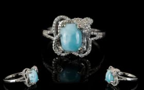 Larimar Solitaire Ring, a cushion cut larimar of 2.