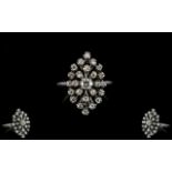 14ct White Gold Attractive Diamond Set Cluster Dress Ring. 'Spray' design. Diamonds of good colour.