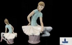 Lladro Porcelain Figure 'Julia' Model 1361. Issued 1978-1993. Height 9" - 22.5 cm.