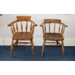 A Pair Of Windsor Style Chairs Each of traditional form with curved armrest and spindle back,