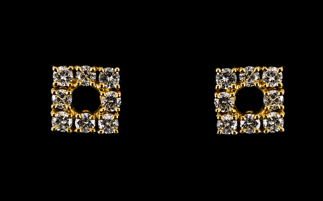 18ct Gold And Diamond Stud Earrings Each of square form set with eight round brilliant cut diamonds,