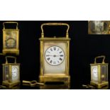 French Repeating Carriage Clock Of typical form with brass lacquered case,
