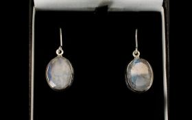 Contemporary Silver And Moonstone Set Earrings Oval form drop earrings, each marked 925 silver.