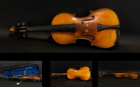 A Late 19th Early 20th Century Violin Two piece back, along with two bows and fitted case,