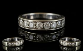 Lady's 9ct White Gold Diamond Set Half Eternity Ring, The Eight Round Diamonds of Good Colour,