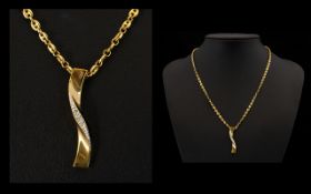 Contemporary Designed 9ct Gold Diamond Set Pendant with Attached 9ct Gold Chain.