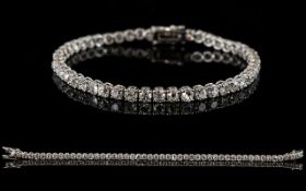 18ct White Gold Diamond Tennis Bracelet, Set With 48 Round Cut Diamonds, Estimated Diamond Weight 8.