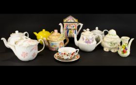 A Collection Of Novelty Decorative Tea Pots to include boot house tea pot with bears, Crownford