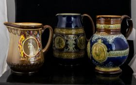 A Collection Of Doulton Burslem Commemorative Jugs To include Queen Victoria 1837 - 1897,