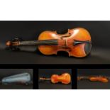 A Late 19th Early 20th Century Violin One piece back, along with bow and fitted case,