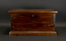Antique Wooden Storage Box Of typical rectangular form with twin brass handles,
