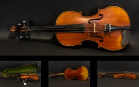 A Late 19th Early 20th Century Violin Two piece back, along with two bows and fitted case,